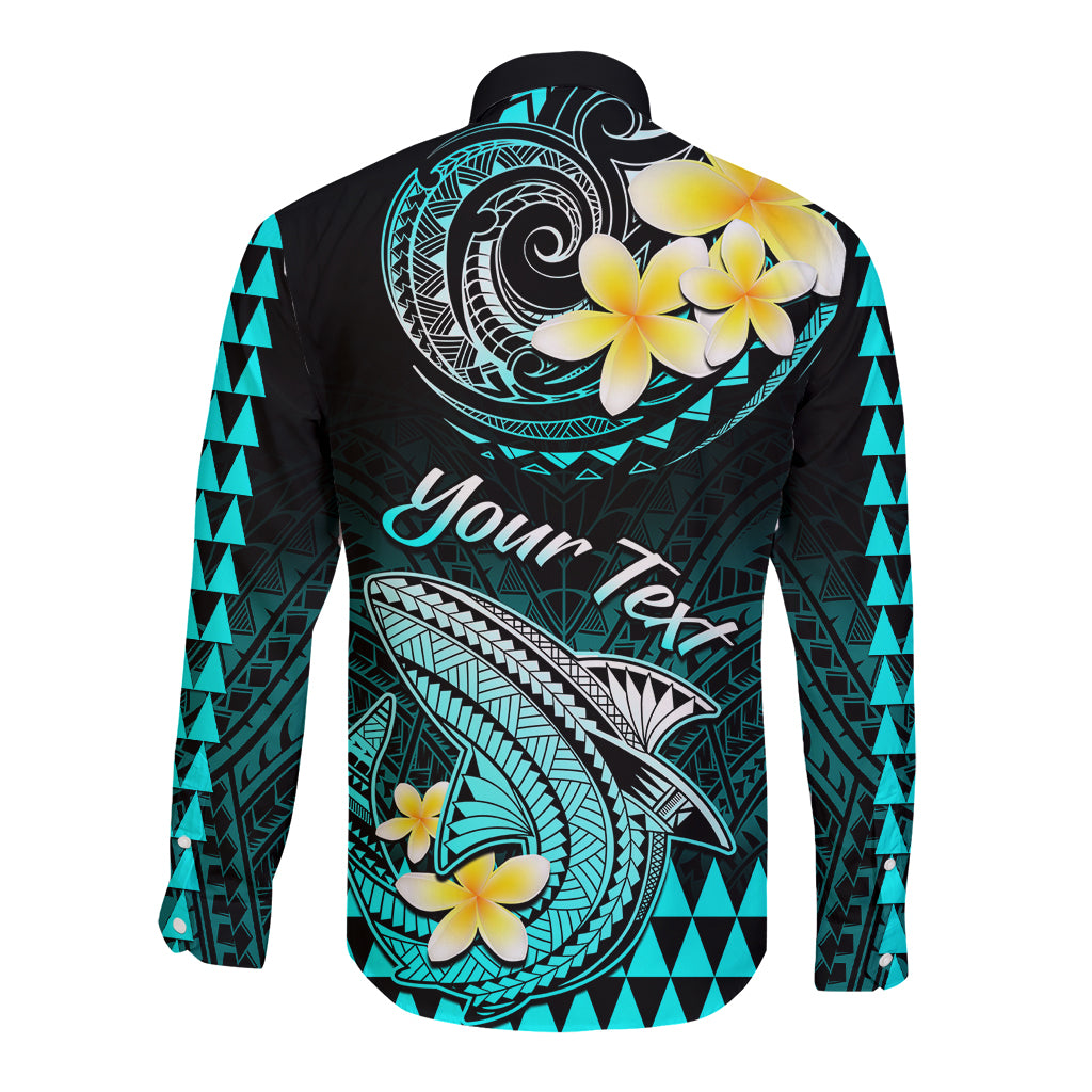 Back view of turquoise and black long-sleeve button shirt with shark artwork, plumeria, and Your Text