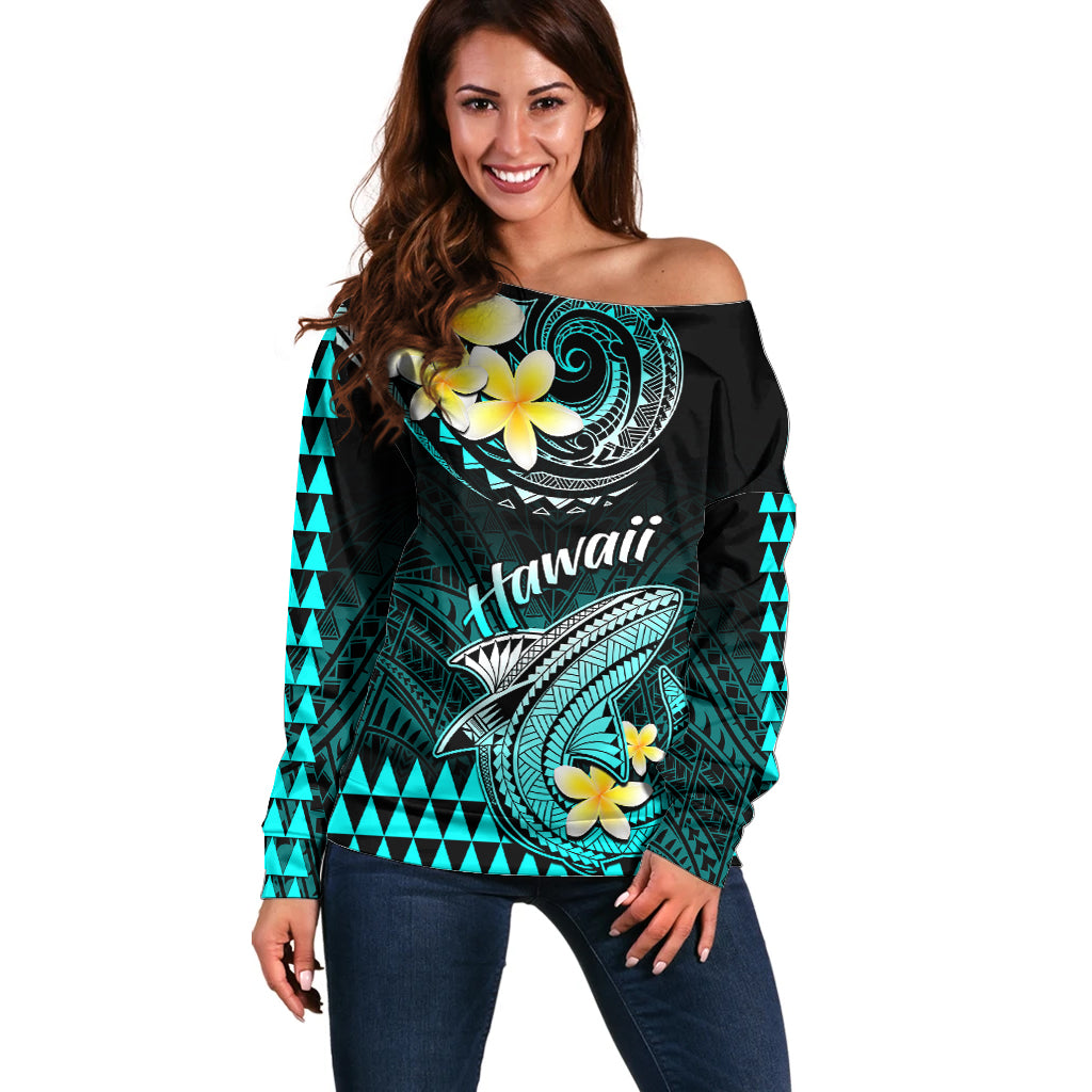 Women’s off-shoulder sweater, black with turquoise shark and yellow flower print, “Hawaii” text
