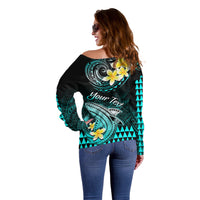 Women’s off-shoulder sweater, black with turquoise back shark graphic and yellow flower accents, “Your Text”