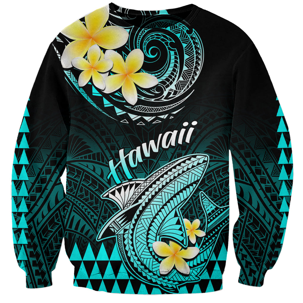 Turquoise and black sweatshirt with Polynesian shark, plumeria flowers, and Hawaii text