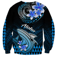 Blue and black unisex sweatshirt with large shark illustration and floral Polynesian print