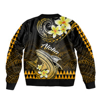 Unisex black bomber jacket with gold shark back print, plumeria flowers and Aloha text