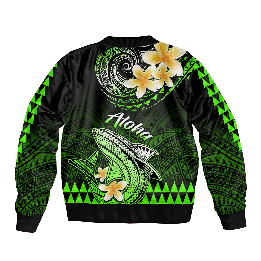 Green and black bomber jacket with Polynesian shark and tiki patterns, hibiscus, ribbed hem