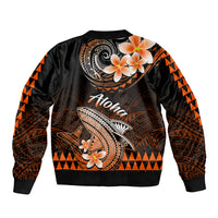 Black bomber jacket with orange Polynesian shark and flower graphics, ribbed collar