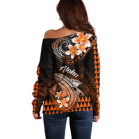 Women’s off-shoulder black sweater with back floral shark graphic and orange triangle pattern