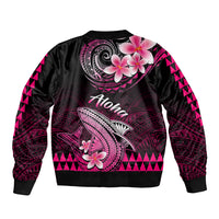 Black bomber jacket with pink plumeria and Polynesian shark back graphic