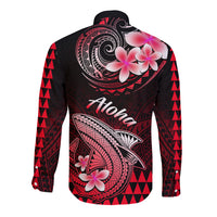 Black back of red long-sleeve button shirt with Aloha text, shark tail, floral print