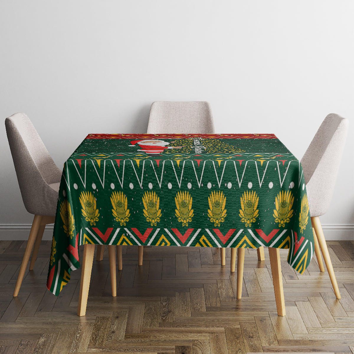 Green Christmas tablecloth on table with gold floral medallion and red-trim pattern