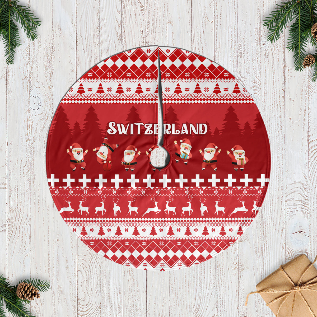 Red circular Christmas tree skirt with Swiss reindeer and Santa pattern, center hole