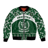 Green bomber jacket with full front zip, white floral pattern and 'PAKISTAN' print
