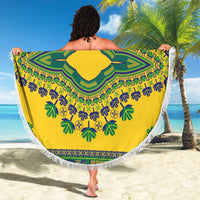 Round yellow beach blanket with large green and blue diamond medallion and white fringe