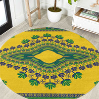 Yellow round carpet with green and blue leaf and geometric dashiki pattern