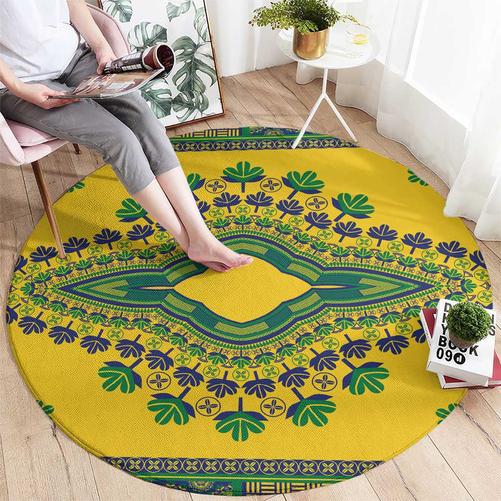Yellow round dashiki patterned carpet with green and blue floral and border motifs