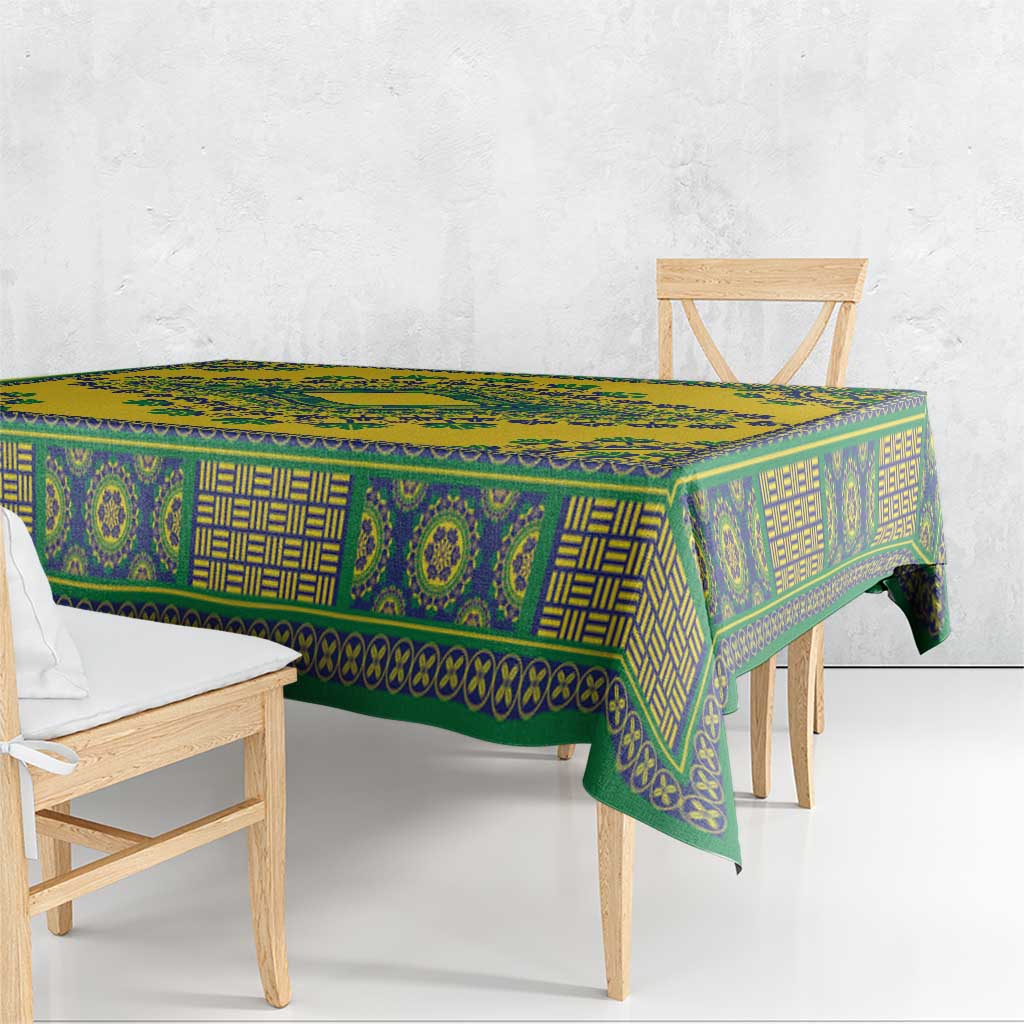 Yellow dashiki tablecloth with teal-green geometric print and hanging corner