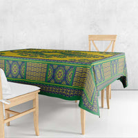 Yellow dashiki tablecloth with teal-green geometric print and hanging corner