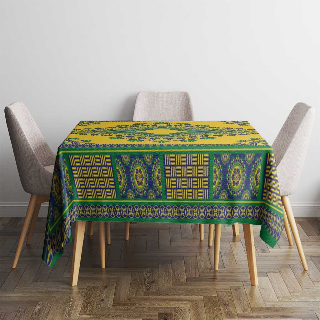 Yellow dashiki tablecloth with teal-green patterned bands on square dining table