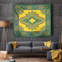 Yellow tapestry wall hanging with green and blue floral border and central medallion