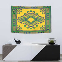 Yellow tapestry with ornate teal and green border, floral fan details, and central medallion