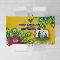Yellow tablecloth with stylized peacock feather print and decorative border text