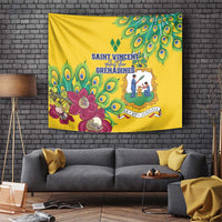 Yellow tapestry with stylized peacock feathers, pink flowers, and Saint Vincent emblem