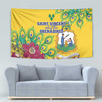 Yellow hanging tapestry with peacock feathers, pink flower accents, and central emblem