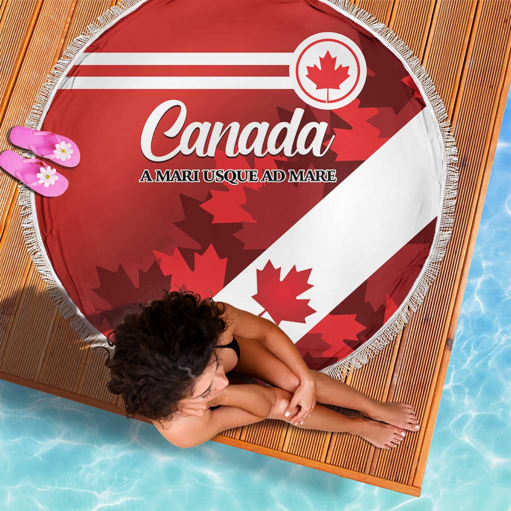 Round beach blanket with red/white diagonal flag, Canada emblem, and fringed border