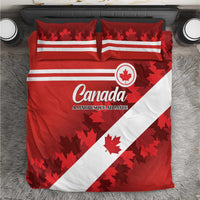 Red and white Canada bedding set with maple leaf flag design and two matching pillows
