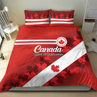 Red Canada bedding set with white diagonal stripe, maple leaf shapes, and two pillows