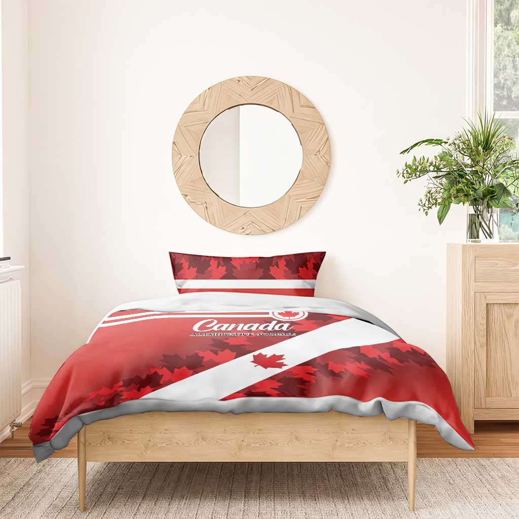 Red Canada comforter with white diagonal stripe and maple leaf print, with two pillow shams