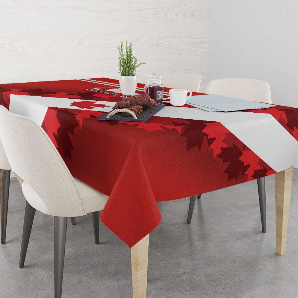 Red tablecloth with white band and scattered maple leaves over dining table