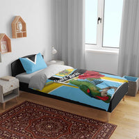 Sky blue duvet and pillowcases with green parrot, red roses, and yellow crest panel