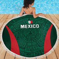 Mexico football beach blanket laid on deck, green Mexico crest graphic with red stripes