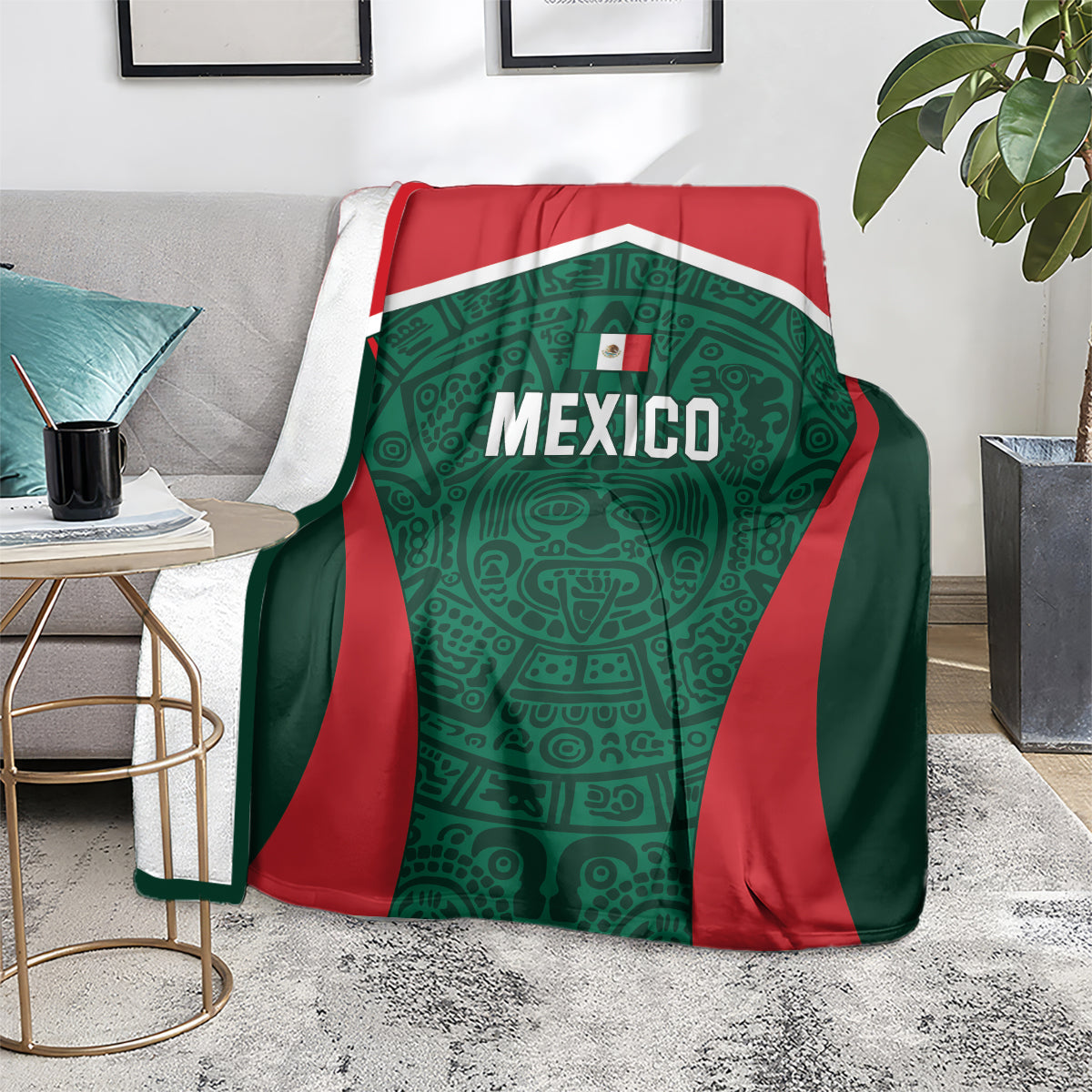 Mexico football blanket on living room sofa, green shield emblem with red sides and Mexico label