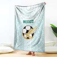 Mint Mexico football blanket with eagle-soccer emblem and geometric pattern, hung