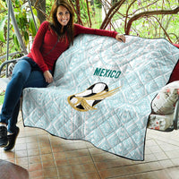 Light blue football quilt with gold soccer emblem and Mexico wordmark, diamond print