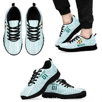 Pair of mint patterned football sneakers with black laces and black soles, 'MEXICO' side