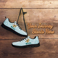 Mint football sneakers with black sole, soccer emblem, and 'MEXICO' on the side