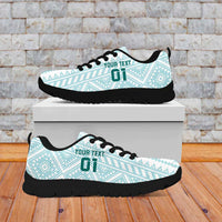 Mint lace-up football sneaker with black sole, '01' detail, and 'MEXICO' lettering
