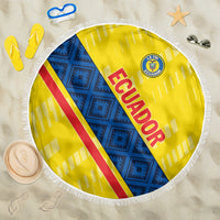 Round Ecuador beach blanket, yellow and blue geometric pattern with red ECUADOR text, fringe trim