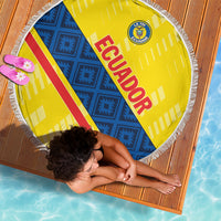 Round Ecuador beach blanket, yellow with blue geometric stripe, red ECUADOR text, fringed edge