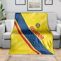 Ecuador-themed football blanket draped on a couch, blue center with red diagonal stripe
