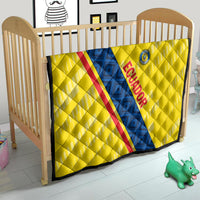 Yellow Ecuador football quilt in baby crib, blue diagonal stripe with red trim, quilted surface
