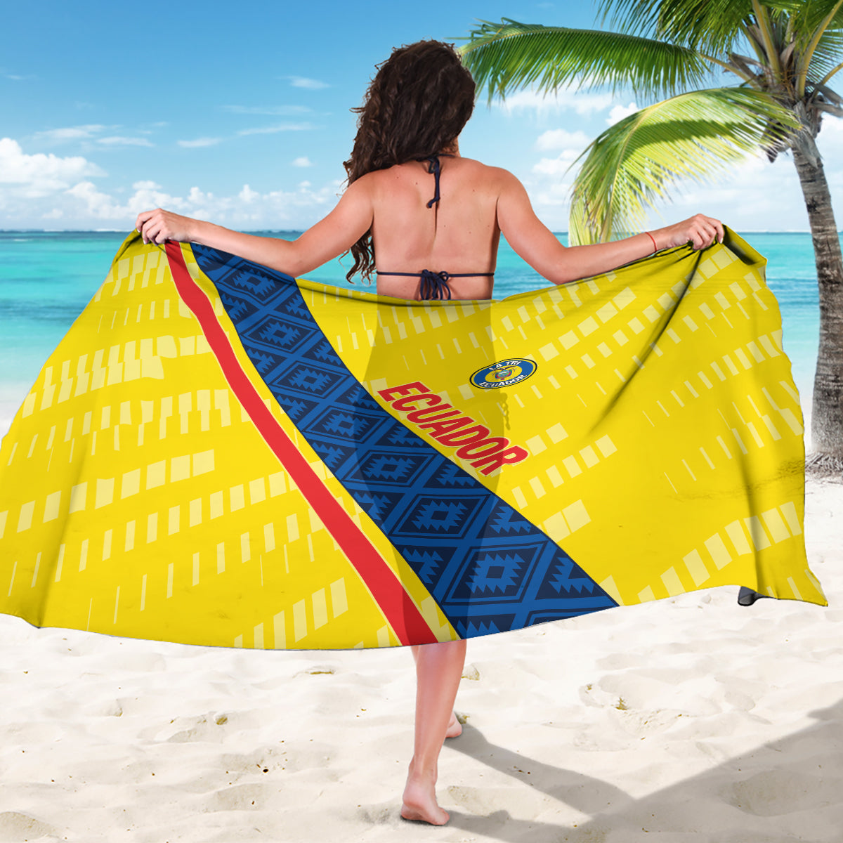 Yellow football sarong spread wide, blue diagonal panel, red stripe, and team crest