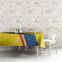 Yellow football tablecloth with Ecuador-style diagonal stripe on dining table