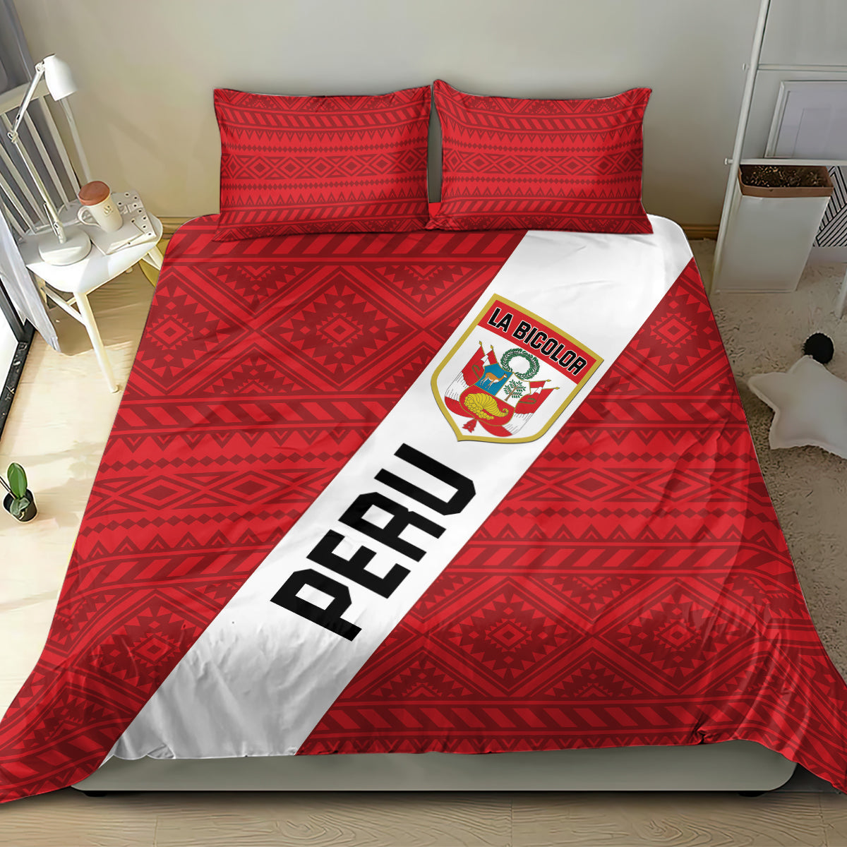 Red Peru football bedding set with La Bicolor crest, diagonal PERU stripe, and geometric pillowcases.