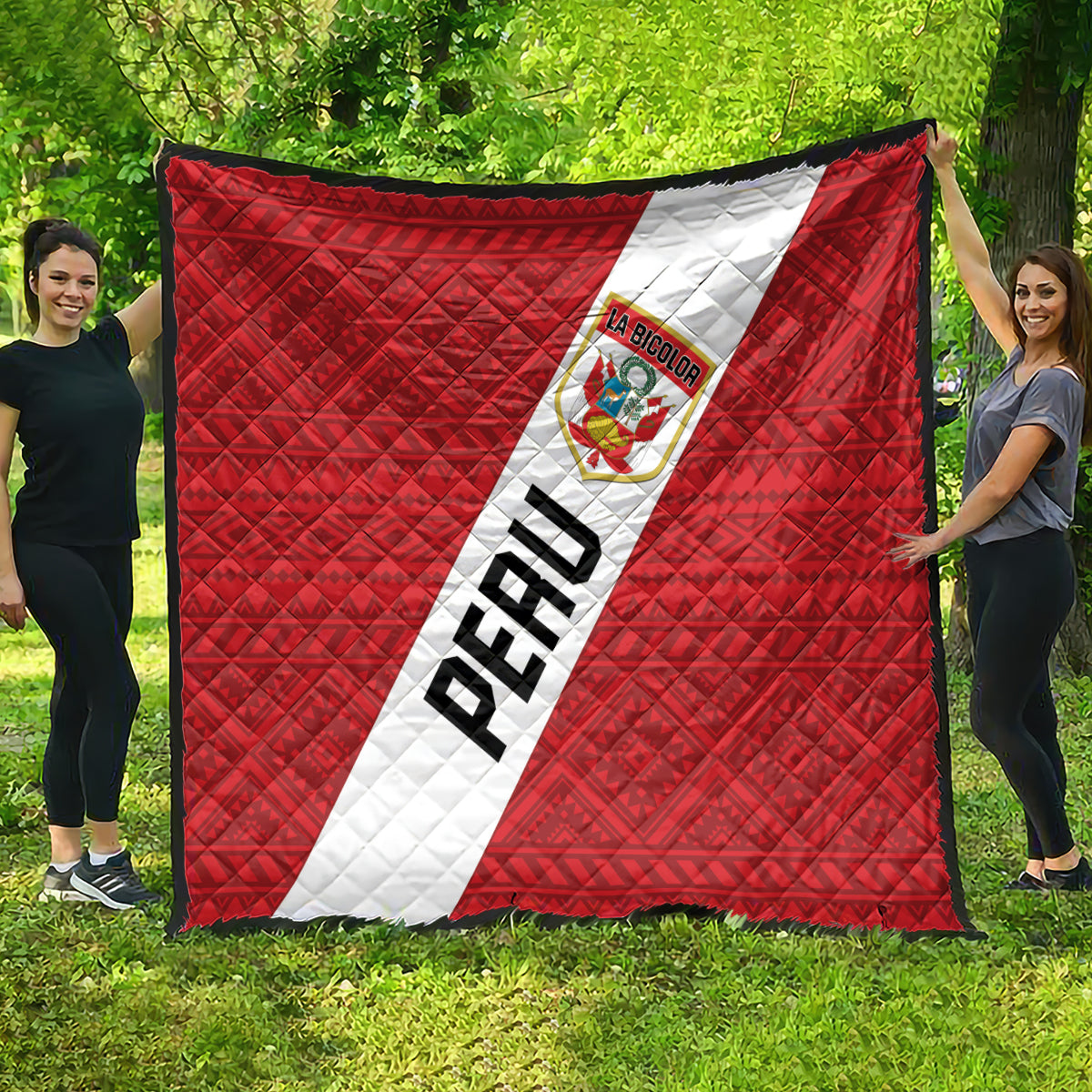 Red Peru football quilt blanket with diagonal white sash, crest logo, and bold PERU text
