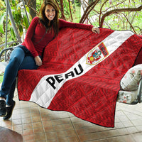 Red Peru football quilt blanket with quilted texture, white diagonal stripe, crest, and PERU