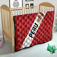 Red Peru football quilt blanket for crib with white diagonal stripe, crest logo, and PERU text