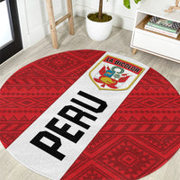 Red round football rug with white band, bold black letters, and LA BICOLOR crest