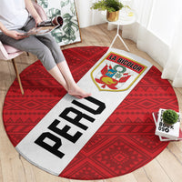 Red round rug with white center stripe, bold black PERU text, and LA BICOLOR crest